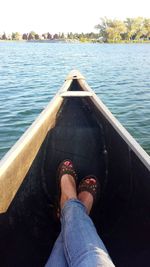 Low section of woman in water