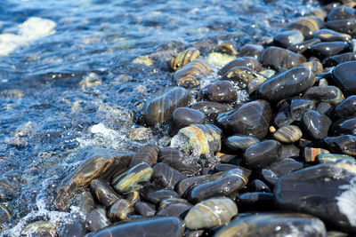 Close-up group of polished stones on beach