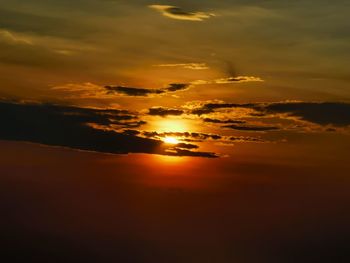 Scenic view of dramatic sky during sunset