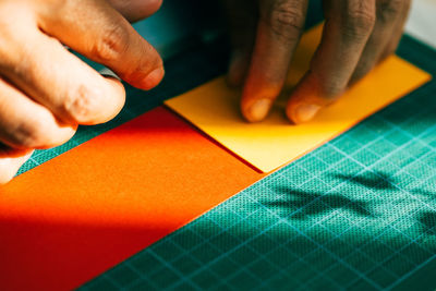 Close-up of man working on table