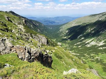 Landscape with mountain range in background