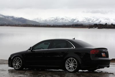 Vintage car on lake during winter