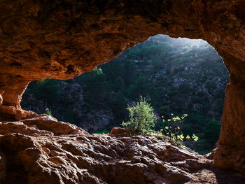 Scenic view of rock formation and cave
