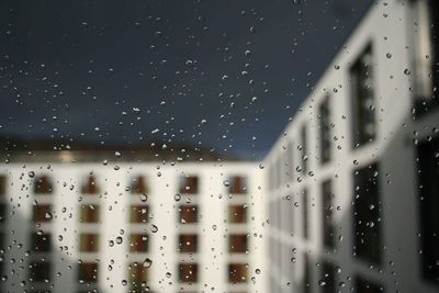 Close-up of wet window in rainy season