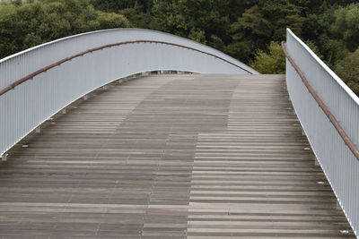 View of the wooden bridge against the hill