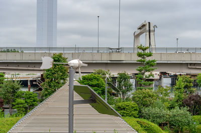 View of bridge and plants against sky