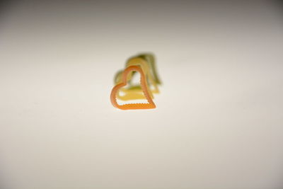 Close-up of toy over white background