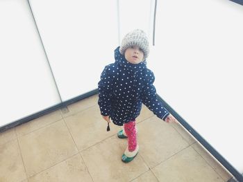 Boy on swing in playground