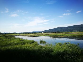 Scenic view of lake against sky