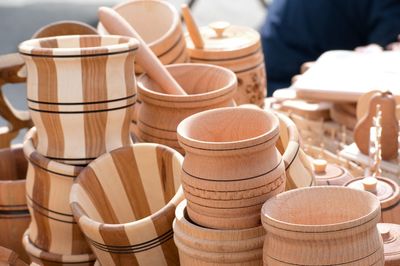 Close-up of wooden containers for sale at market stall