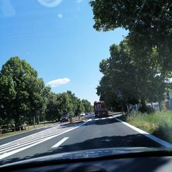 Road seen through car windshield