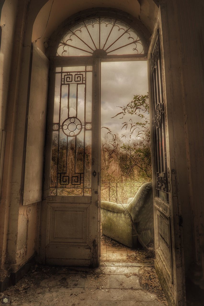 window, indoors, architecture, door, built structure, abandoned, entrance, arch, closed, old, house, obsolete, damaged, run-down, day, doorway, no people, building exterior, deterioration, open