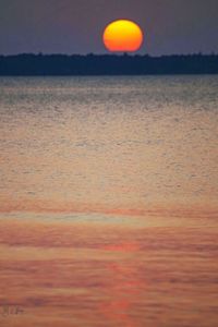 Scenic view of sunset over sea