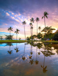 Scenic view of lake against sky during sunset