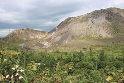 Scenic view of volcanic landscape against sky