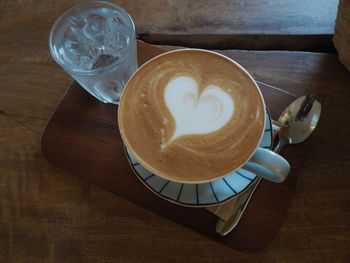 High angle view of coffee cup on table