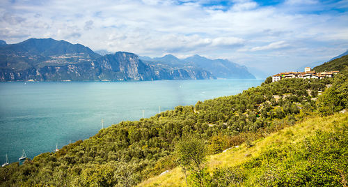 Scenic view of sea against cloudy sky