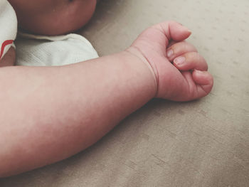 Low section of baby feet