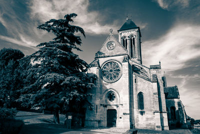 Low angle view of church against sky
