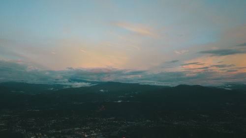 Scenic view of mountains against sky during sunset