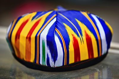 Close-up of multi colored ball on table