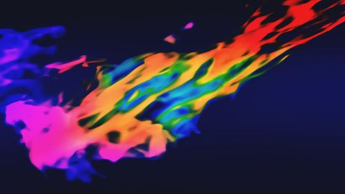 Low angle view of illuminated lights at night