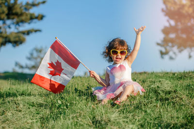 Portrait of girl on field