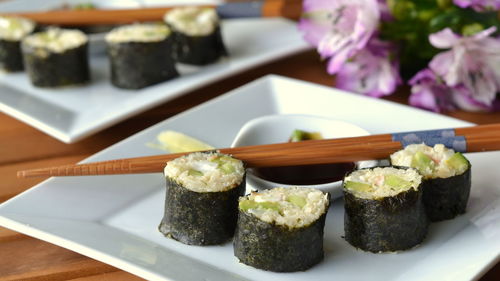 Close-up of sushi served on table