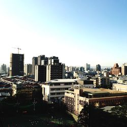 Cityscape against clear sky