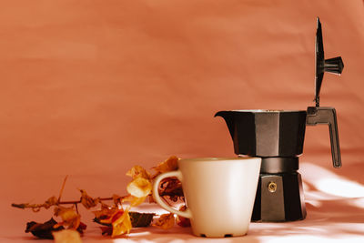 Close-up of coffee cup on table