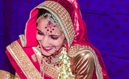 Smiling young bride during wedding