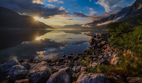 Scenic view of sea against sky during sunset