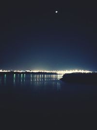 Scenic view of sea against sky at night