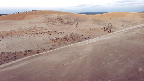 Scenic view of desert against sky