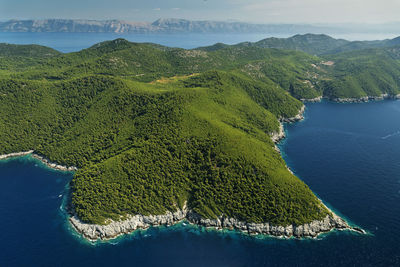 High angle view of bay against sky