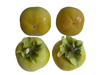 High angle view of apple against white background