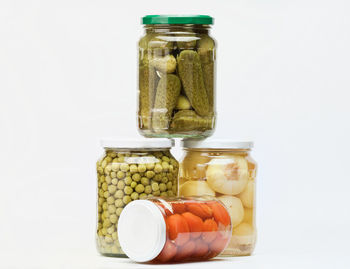 Close-up of bottles against white background