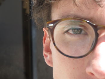 Close-up of man wearing eyeglasses