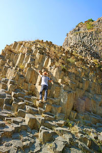 Low angle view of rock formations