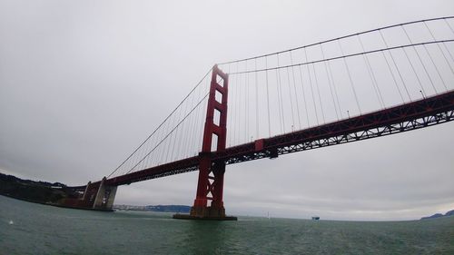 View of suspension bridge in foggy weather