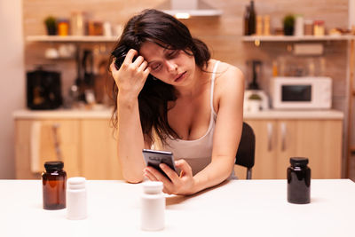 Young woman using mobile phone