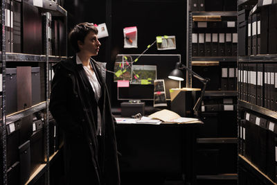 Young woman standing in store