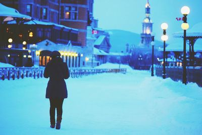 Woman standing in city