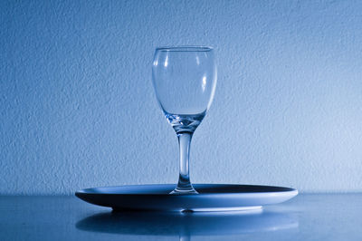 Close-up of wineglass on table