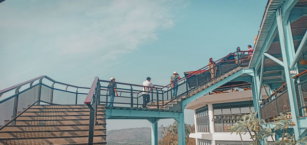 Low angle view of people on steps