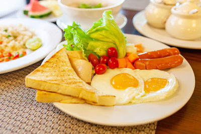 Close-up of breakfast served on table