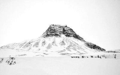 Scenic view of snow covered mountains