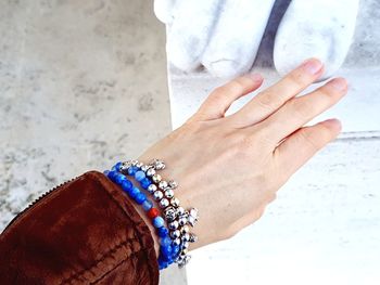 Close-up of woman hand holding umbrella