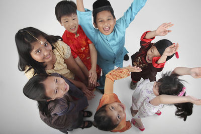High angle view of children on white background