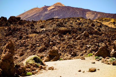 Scenic view of desert against clear sky